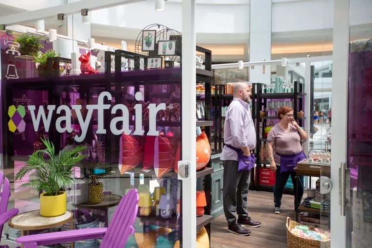 Brian Kuznesoff, store manager of Wayfair, stands with retail associate, Dawn Hagopian, in the store at the King of Prussia Mall, Monday, August 5, 2019. Pop ups such as Wayfair and Dormify are coming from online to life at the mall.