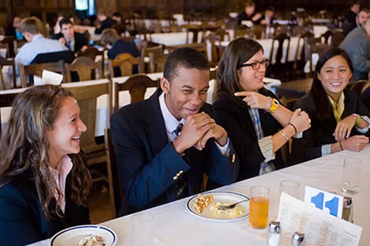 Hill School student Johnny Corson (2nd from left), 18, of Pottstown, laughs with Christina Bell (left), 15, of Honey Brook, Carolyn Minks, 17, of Westchester, N.Y., and Maho Sakuma, 16, of Japan. (Clem Murray / Staff Photographer)