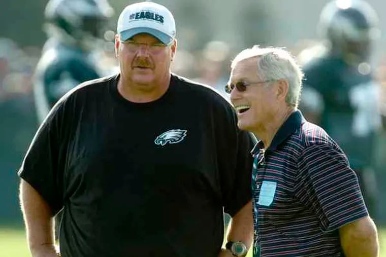 Former Eagles coach Dick Vermeil visits with Andy Reid,  another coach who took the Birds to the Super Bowl, at the team's training camp.