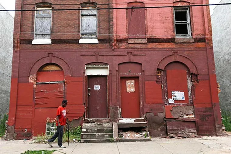 Philadelphians are forced to walk through blighted neighborhoods, which a land bank bill signed into law in January is meant to help eliminate. City Council President Darrell Clarke needs the land bank to be operational soon if he is going to build 1,500 housing units in two years.