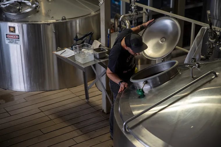 Andrew Foss brewing beer at Mainstay Independent.