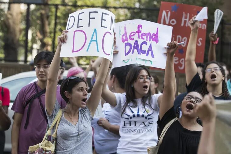The Trump Administration announced its decision to end DACA on Tuesday, Sept. 5, 2017. The group marched from the Philadelphia offices of the Justice Department to the Federal Detention Center at 8th and Arch Sts., where they are shown gathered. CHARLES FOX / Staff Photographer