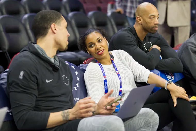 The Sixers have promoted former Duke and WNBA star Lindsey Harding (center) from full-time scout to player development coach, making her the seventh female assistant in NBA history.