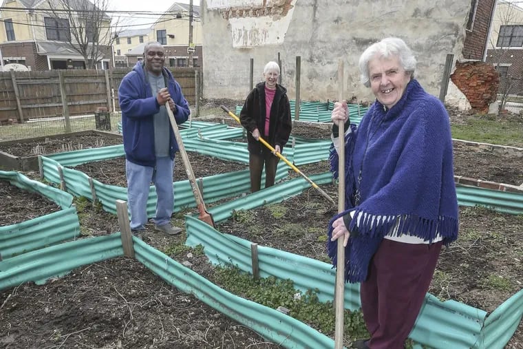 Gary Robbins with Sister Sylvia Strahler, center and Sister Margaret McKenna pose in the New Jerusalem Laura recovery Center Garden on Norris Street in North Philadelphia. Tuesday, March 27, 2018.