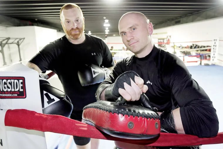 David Platt (left) and James Gregory hatched the idea of creating WiFi hotspots around the city at a gym, where they first met kickboxing.