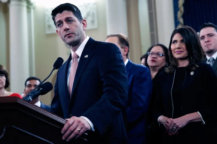 House Speaker Paul Ryan  speaks next to Rep. Kristi Noem (R., S.D.) during a news conference announcing the GOP tax legislation Thursday.