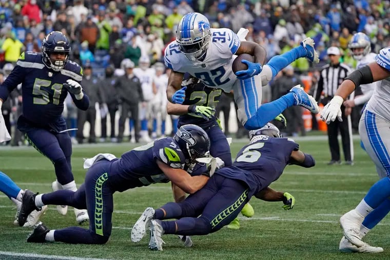 Detroit Lions running back D'Andre Swift, a St.Joe's Prep graduate, seeks new heights during his third-year in the NFL. (AP Photo/Elaine Thompson)