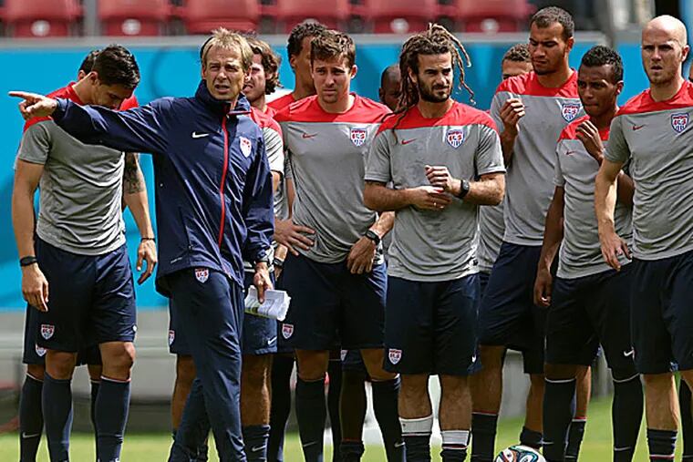 United States head coach Jurgen Klinsmann instructs his team.