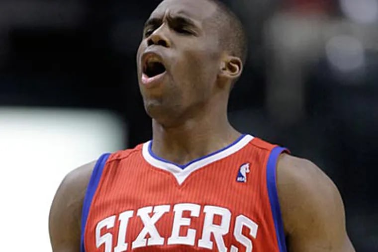 Jodie Meeks reacts after hitting a three late in the game. (Michael Conroy/AP)