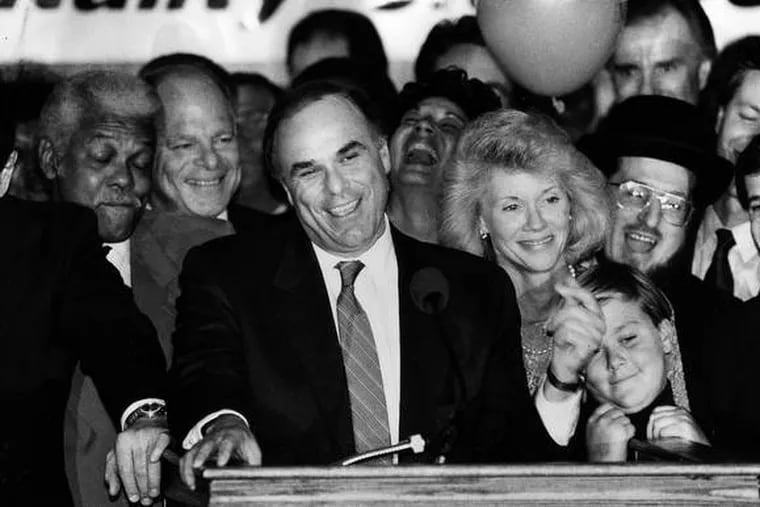 Ed Rendell with his wife, Midge, and son, Jesse, are joined by supporters as they celebrate his election as mayor of Philadelphia in 1991.