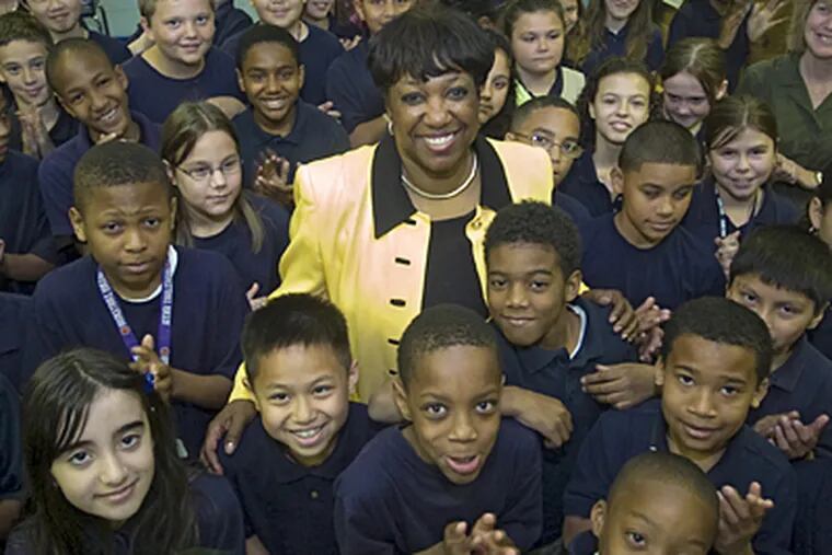 New Philadelphia schools chief Arlene Ackerman is surrounded by the fifth graders at Fox Chase Elementary School, the first school she visited on her first day of work. (Clem Murray/Inquirer)