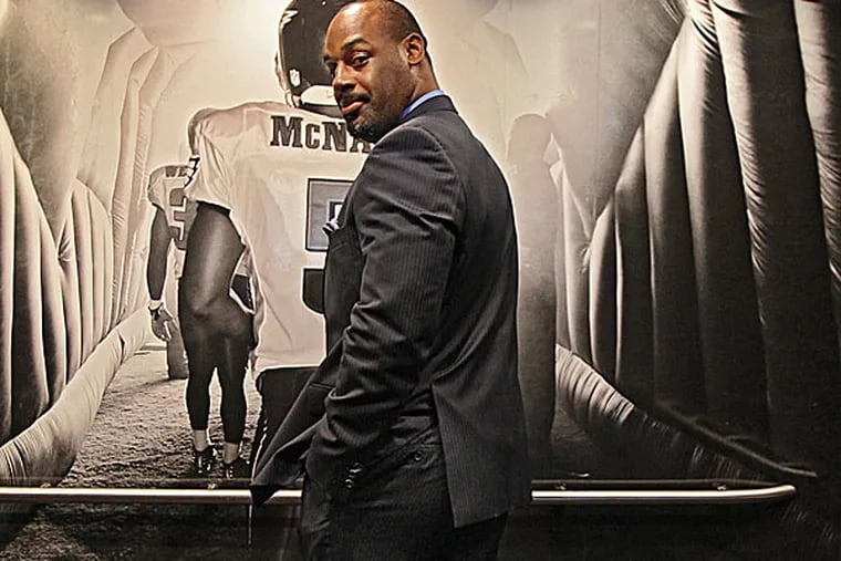 Former Eagles quarterback Donovan McNabb, in a Lincoln Financial Field elevator that bears his likeness. (Michael Bryant/Staff Photographer)