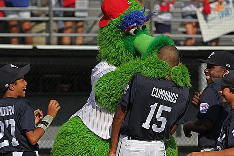 The Phillie Phanatic and the Taney Little League baseball team. (Michael Bryant/Staff Photographer)