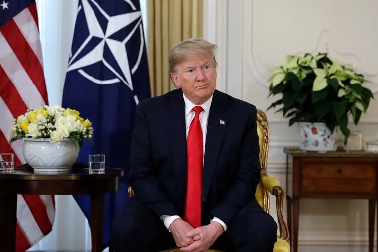 U.S. President Donald Trump meets NATO Secretary General, Jens Stoltenberg at Winfield House in London, Tuesday, Dec. 3, 2019. US President Donald Trump will join other NATO heads of state at Buckingham Palace in London on Tuesday to mark the NATO Alliance's 70th birthday. (AP Photo/Evan Vucci)