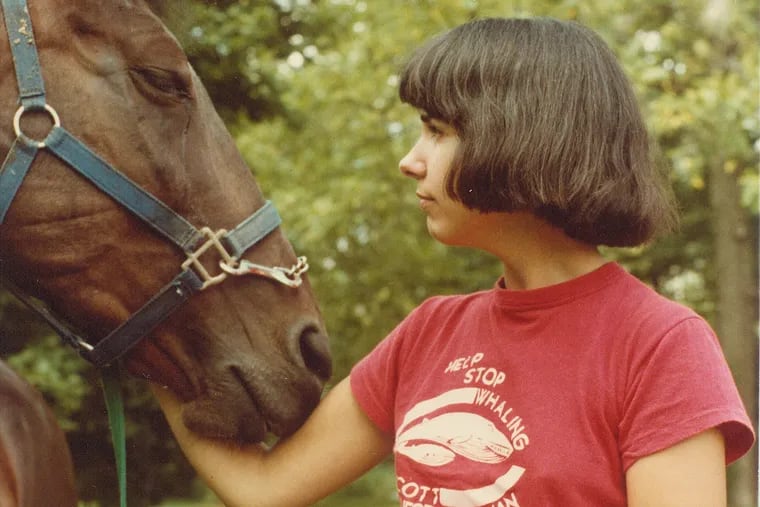 The author, Cynthia Branigan, with Gamal, a retired Atlantic City diving horse who flourished under her care for nine years until his death in 1989.