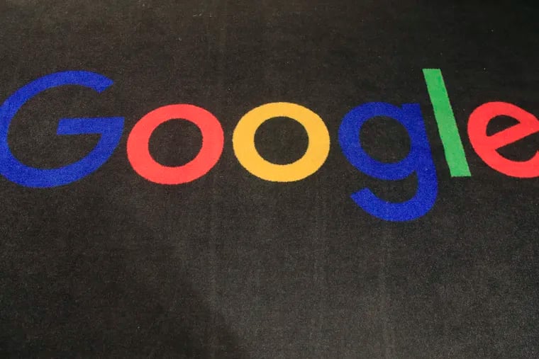 The logo of Google is displayed on a carpet at the entrance hall of Google France in Paris, Monday, Nov. 18, 2019. European Union officials are nearing agreement on a set of new rules aimed at protecting internet users by forcing big tech companies like Google and Facebook to step up their efforts to curb the spread of illegal content. EU officials were negotiating over the final details of the new legislation, dubbed the Digital Services Act, on Friday, April 22, 2022.