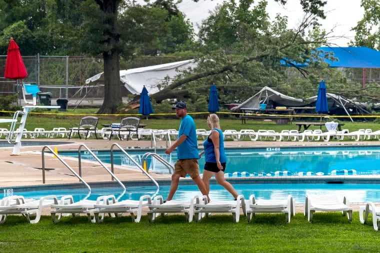 The scene at the Dolphin Swim Club on West Bristol Road in Lower Southampton, Bucks County, Sunday after a tree fell on a party tent near the pool.