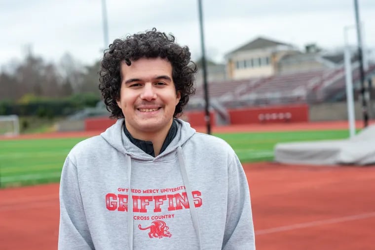 Sebastian DeSimone, who is in Gwynedd Mercy University's Integrated Studies Program for students with intellectual disabilities, near the university track. He got a waiver from the NCAA to run on the track and cross country teams. Now, other students like him will have an easier process to follow.