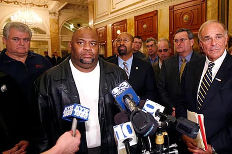 Union leaders joined SEPTA officials, Mayor Nutter and Rep. Bob Brady at a news conference with Gov. Rendell, who brokered the deal a day after he said he was leaving the negotiations. (Charles Fox/Staff Photographer)
