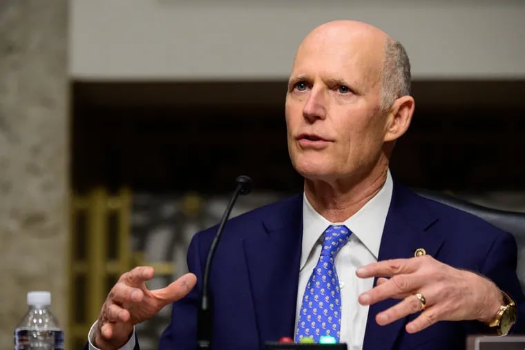 Sen. Rick Scott, R-Fla., shown speaking during a Senate hearing in February, claims inflation is to blame for Medicare premium increases. That's just wrong, experts say.