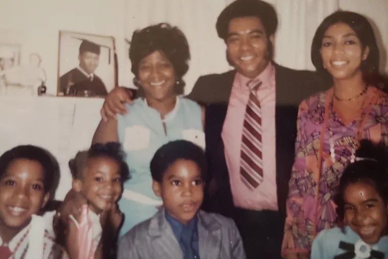 Mr. Fultz (center rear) is with wife Joyce (left rear), sister Lorna Fultz-Martin (right rear) and children (front left to right) Ronald Jr., Renae and Rodney.  His niece, Traci Martin-Miller, is front right.