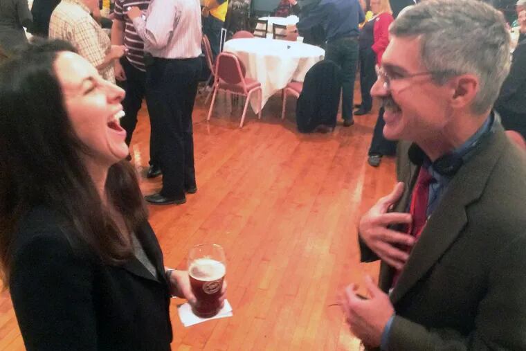 Republican mayoral candidate Melissa Murray Bailey enjoys a beer and laugh with KYW NewsRadio reporter Mike DeNardo after the polls closed Tuesday night.