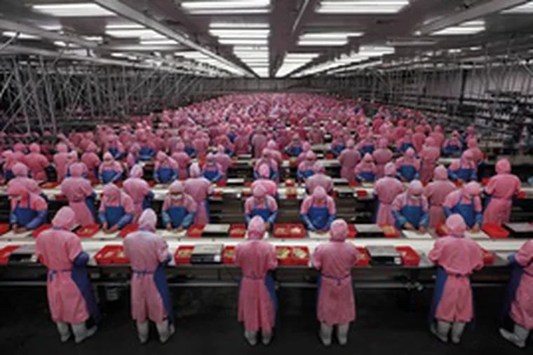&quot;Manufactured Landscape&quot; looks at industrialization in China, as in this scene of a chicken processing plant .