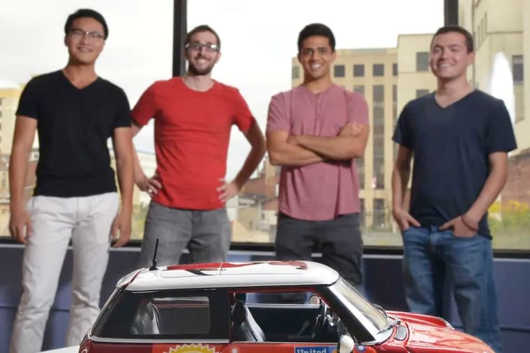Carvertise pays drivers to advertise brands on their cars. Founder Mac Nagaswami (center right) and business partner Greg Star (center left). &quot;There are thousands of cars out there driving thousands of miles,&quot; Nagaswami says.