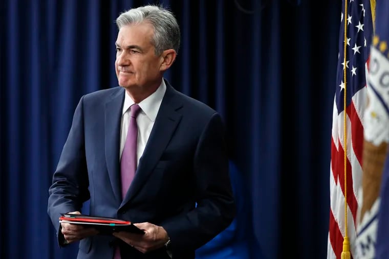 Federal Reserve Chair Jerome Powell arrives to a news conference after the Federal Open Market Committee meeting.