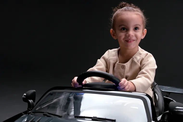 A photo of a kid "test driving" a car like the ones that will be at the Lil Benz Dealership. (Courtesy of Mercedes-Benz USA)