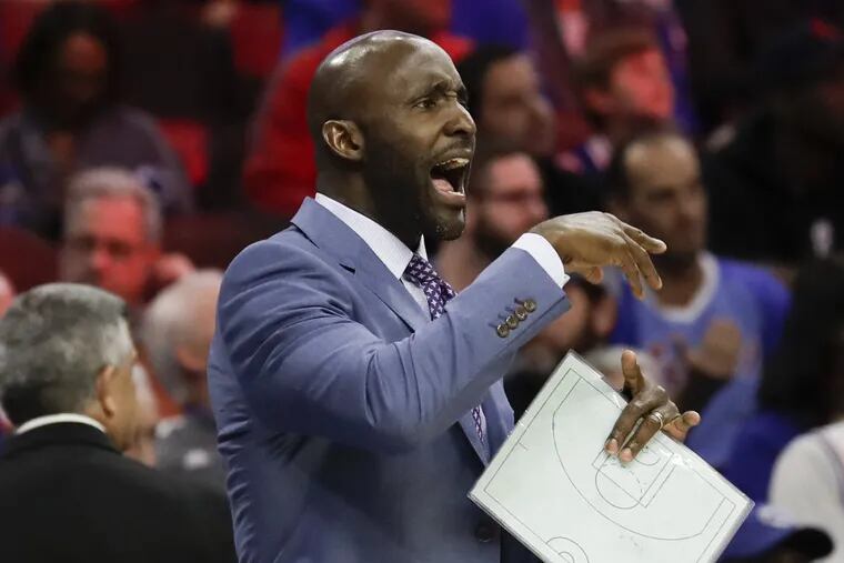 Sixers assistant Lloyd Pierce yells to his team during Philly’s 101-98 overtime loss to the Celtics in Game 3 of the Eastern Conference semifinals.