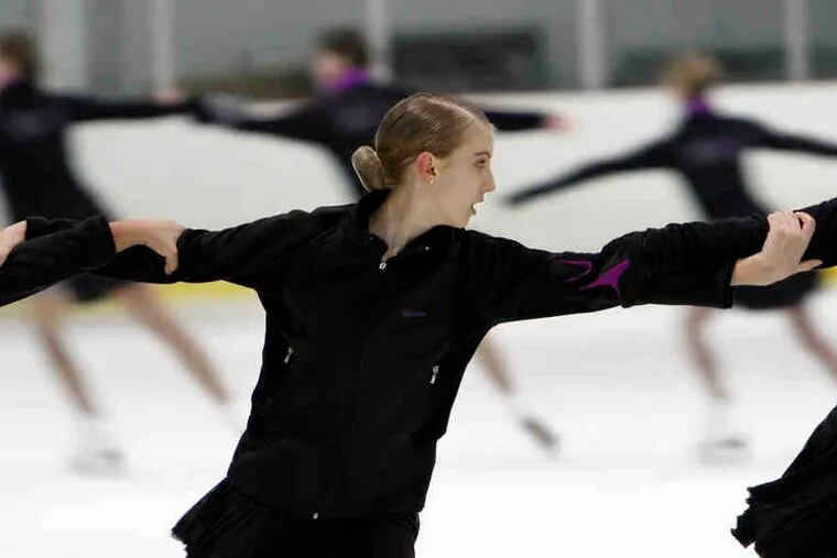 Marina Tomlinson practices with the Symmetry synchronized skating team. Members range in age from 13 to 18 and are proud of being sturdy and tough.