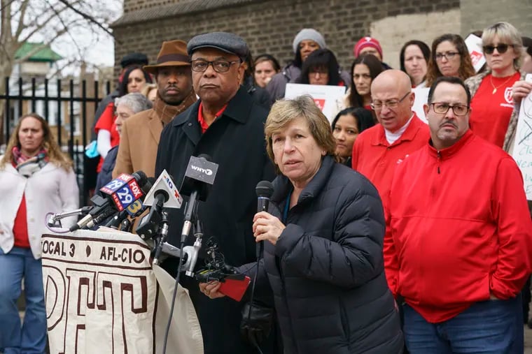 Randi Weingarten, president of the American Federation of Teachers, speaks at a news conference Wednesday, as teachers, staff, parents and students demand quicker action on asbestos inside Philadelphia schools. The group stood outside Hopkinson Elementary in Juniata, the eighth Philadelphia School District building forced to close because of asbestos this school year.