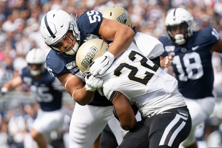Penn State defensive tackle Antonio Shelton (55) taking down Idaho running back Aundre Carter during a game in August.