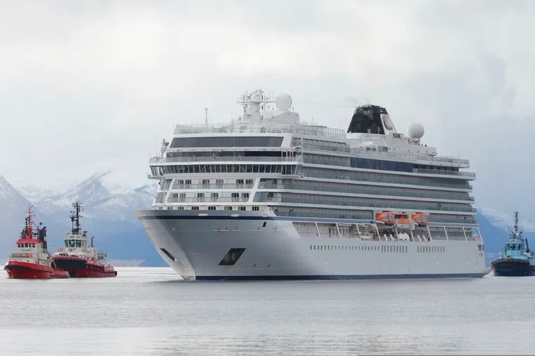The cruise ship Viking Sky arrives at port off Molde, Norway, on Sunday after encountering problems in heavy seas off Norway's western coast.