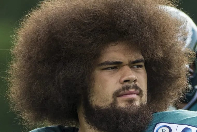 Eagle offensive guard #73, Isaac Seumalo, at Monday’s practice, shows he still has the best hair in the NFL. 08/14/2017 MICHAEL BRYANT / Staff Photographer