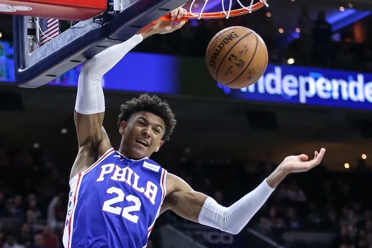The Sixers' Matisse Thybulle dunks against the Pistons in the last game before the pandemic shut down the season.