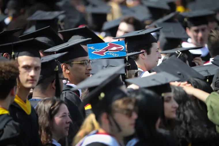 University of Pennsylvania students attend a commencement ceremony at Franklin Field in Philadelphia in 2022. This year's graduation will have heightened security due to ongoing protests of the Israel-Hamas war.