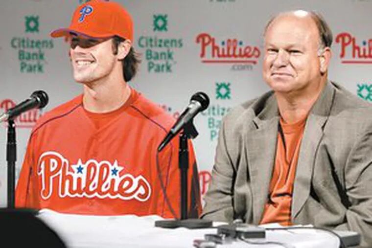 Phillies scouting director Mike Arbuckle is seen with pitcher Cole Hamels before his first major-league start in 2006. Hamels was drafted by the Phillies in 2002.
