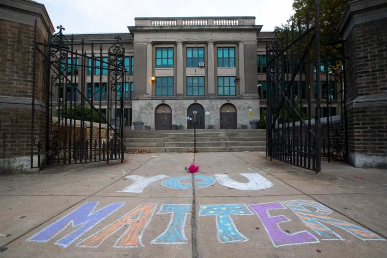 Some of the sidewalk chalk slogans outside of Roxborough High School on Sept. 29 done by various Roxborough mothers. Nicolas Elizalde was fatally shot and four other teens were wounded.