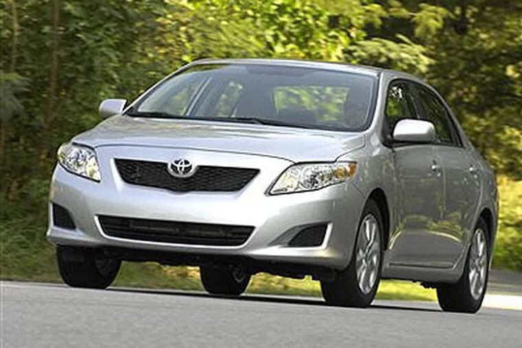 A 2010 Toyota Corolla is seen. Japan's Toyota Motor Corp. announced late Tuesday that it would halt sales of some of its top-selling models, including the Corolla, to fix gas pedals that could stick and cause unintended acceleration.  (AP Photo / Toyota Motor Corp.)