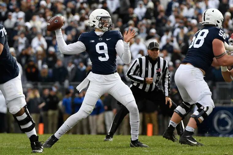 Penn State freshman quarterback Christian Veilleux, making his collegiate debut, throws a pass against Rutgers during the first half of an NCAA college football game in State College, Pa., Saturday, Nov. 20, 2021.  Veilleux, who replaced starter Sean Clifford, threw three TD passes.