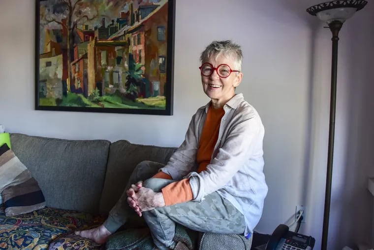 Madeleine McHugh Pierucci, 77,  in her Center City co-op. She says that being a first-generation college student at the University of Pennsylvania “created a disconnect between me and my family.”
