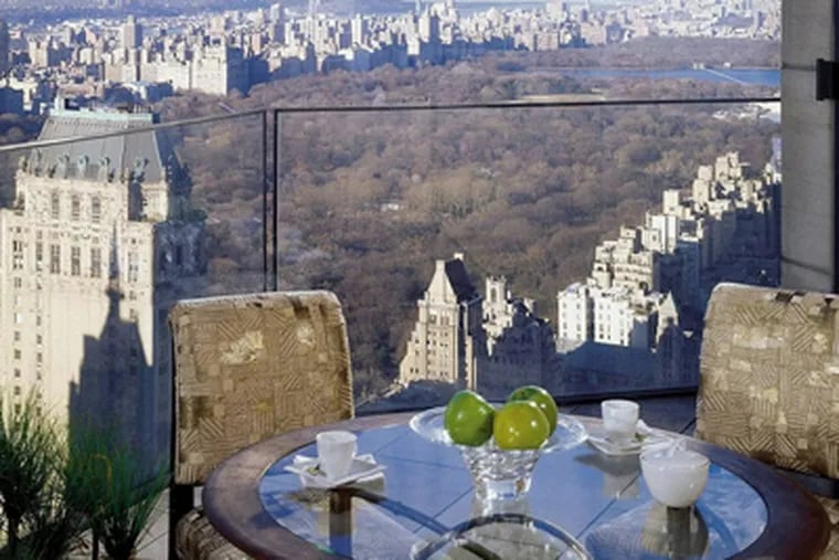 With cantilevered glass balconies and floor-to-ceiling bay windows, the Ty Warner Penthouse at the Four Seasons New York offers a breathtaking 360-degree view of all Manhattan. The 4,300-square-foot suite rents for $35,000 a night. (Photo via fourseasons.com)