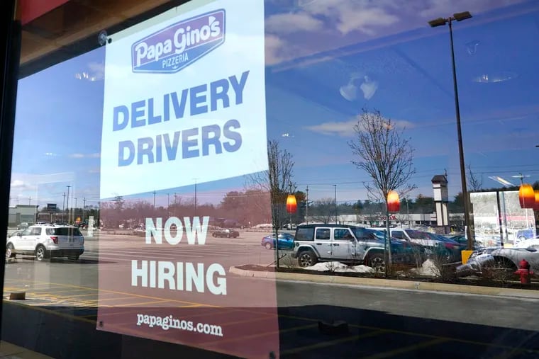 A "Now Hiring" sign was displayed earlier this month in Salem, N.H.
