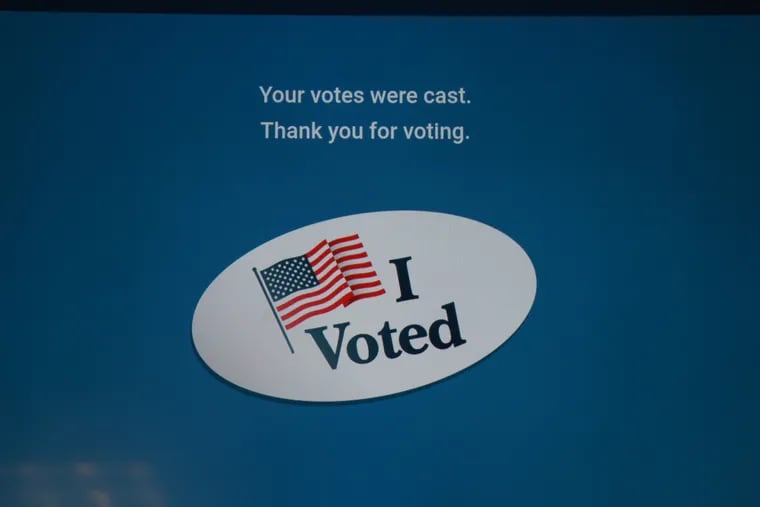An example screen on a new voting booth, that features  with electronic screens and paper confirmations, in Philadelphia, April 30, 2019.