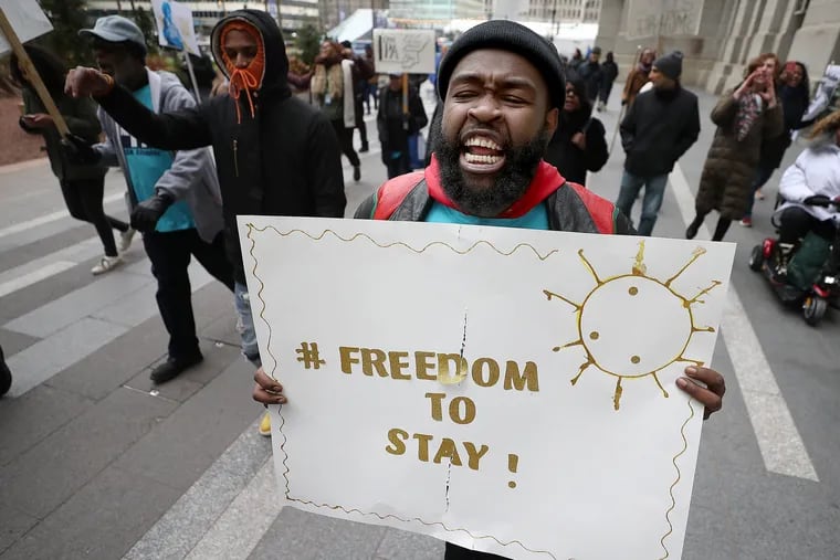 Dante McCall, of One PA, chanting with fellow demonstrators as they marched around City Hall in Philadelphia on Feb. 20. The group is seeking protections for renters and homeowners amid a gentrifying Philadelphia.