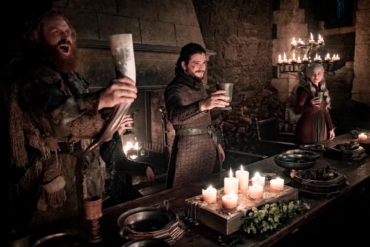 This image released by HBO shows Kristofer Hivju, from left, Kit Harington and Emilia Clarke in a scene from "Game of Thrones."  "Game of Thrones," "Veep" and "The Big Bang Theory," three major series that wrapped last season, will find out with Tuesday's nominations if they have one more chance at Emmy gold.