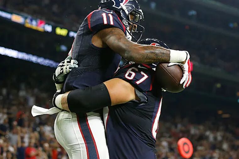 Houston Texans receiver Jaelen Strong (11) celebrates his third quarter touchdown with guard Cody White (67) against the San Francisco 49ers in a preseason NFL football game at NRG Stadium. The Texans beat the 49ers 23-10.