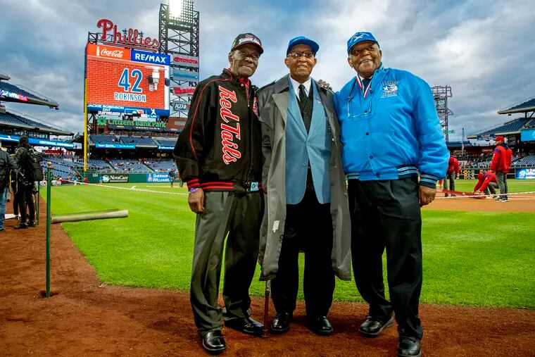 Tuskegee Airmen from the Philadelphia region, James Cotten (from left), Eugene Richardson and Nathan Thomas are honored before the Phillies-New York Mets game as Major League Baseball commemorates Jackie Robinson Day at Citizens Bank Park April 15, 2019.